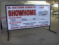 SIGN_STANDS_W_SHOWHOME_SIGN.jpg